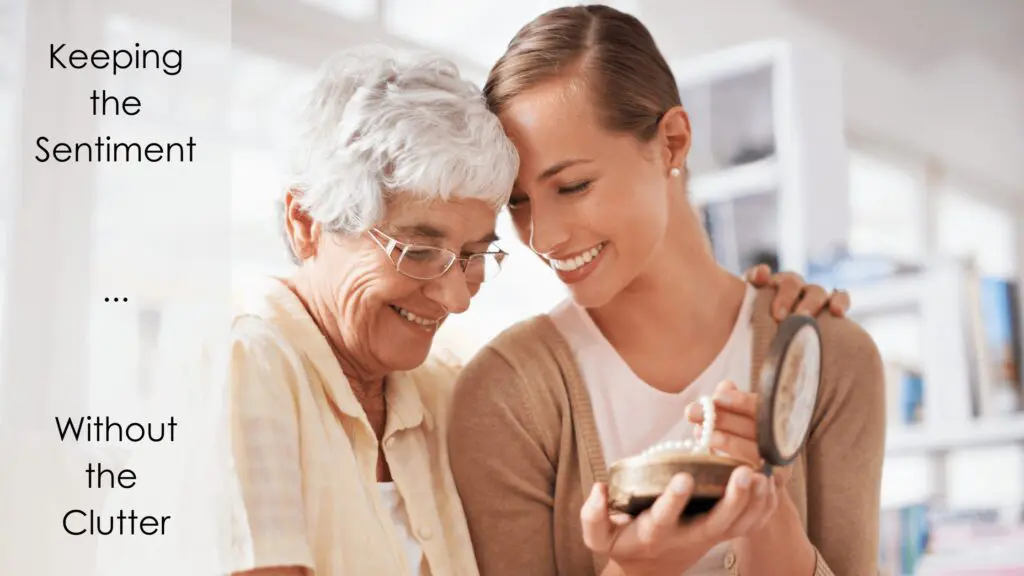 A woman and an older lady looking at something on the screen.